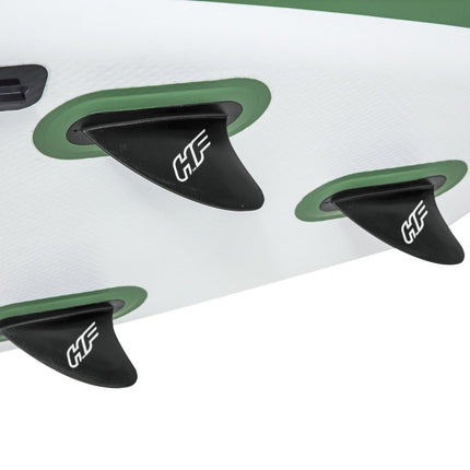 Drie zwarte vinnen onder witte sup board