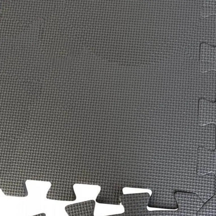 Close-up van de grijze Intex vloertegels met puzzelverbinding